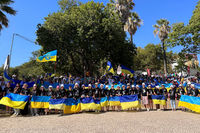 Українська молодь прийшла на&nbsp;Хресну дорогу з&nbsp;Папою у&nbsp;вбранні з&nbsp;портретами вбитих росією українських дітей